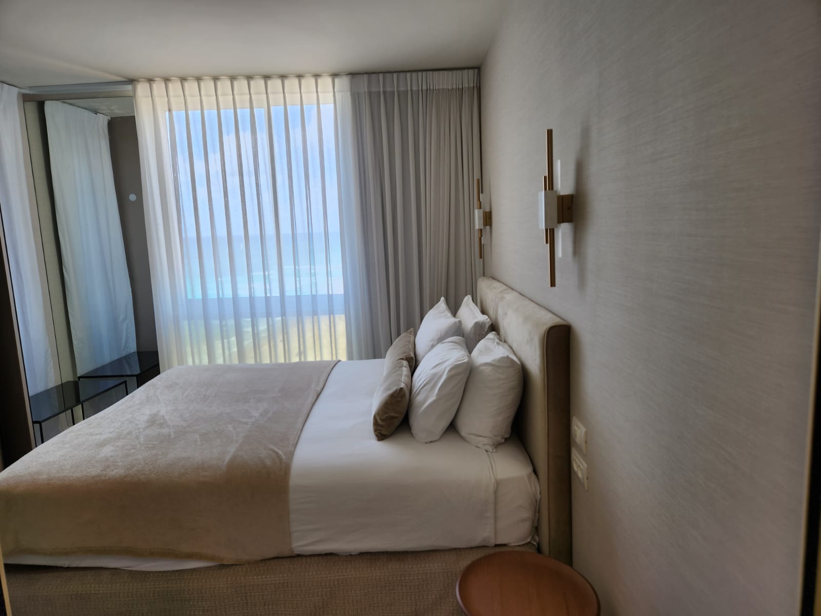 Minimalist coastal bedroom with ocean views