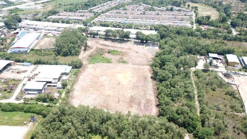 Wide aerial photograph of the expansive development area